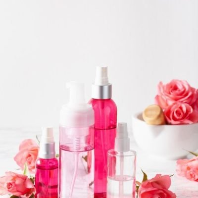 bottles-skincare-lotion-serum-medical-rose-flowers-organic-natural-cosmetic_214995-124