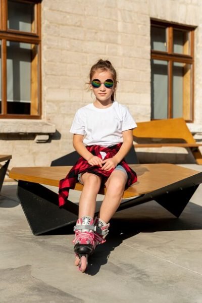 front-view-girl-with-inline-skates_23-2148268045