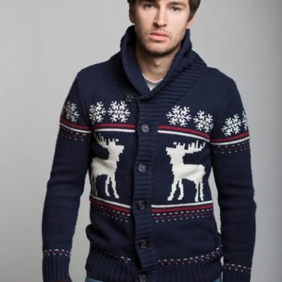 portrait-happy-young-man-christmas-warm-knitted-jacket_257482-1125