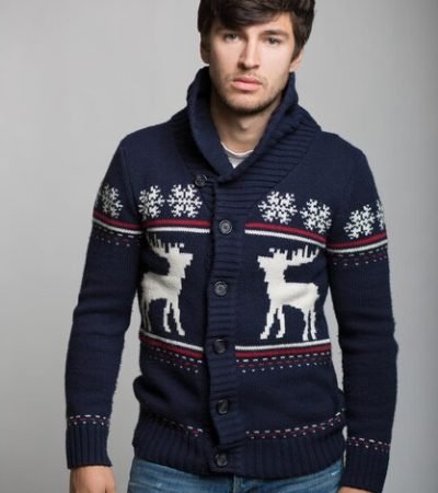 portrait-happy-young-man-christmas-warm-knitted-jacket_257482-1125